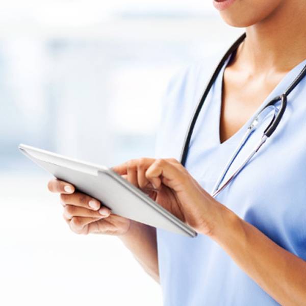 nurse or doctor using digital tablet